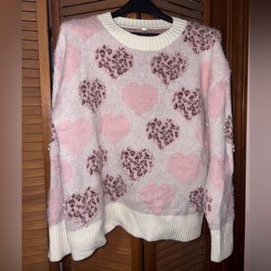 Fuzzy leopard heart pearl sweater.